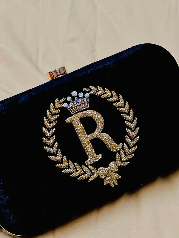 Elliptical Monogrammed Clutch